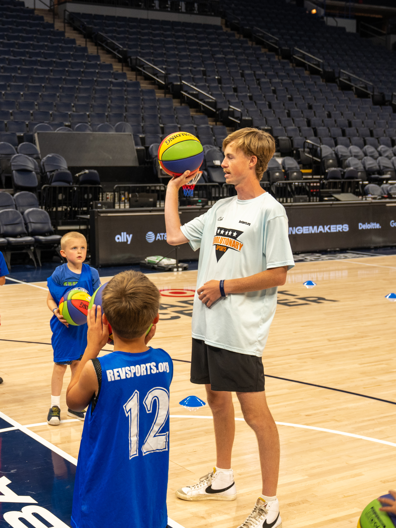 RevSports coach leading athletes