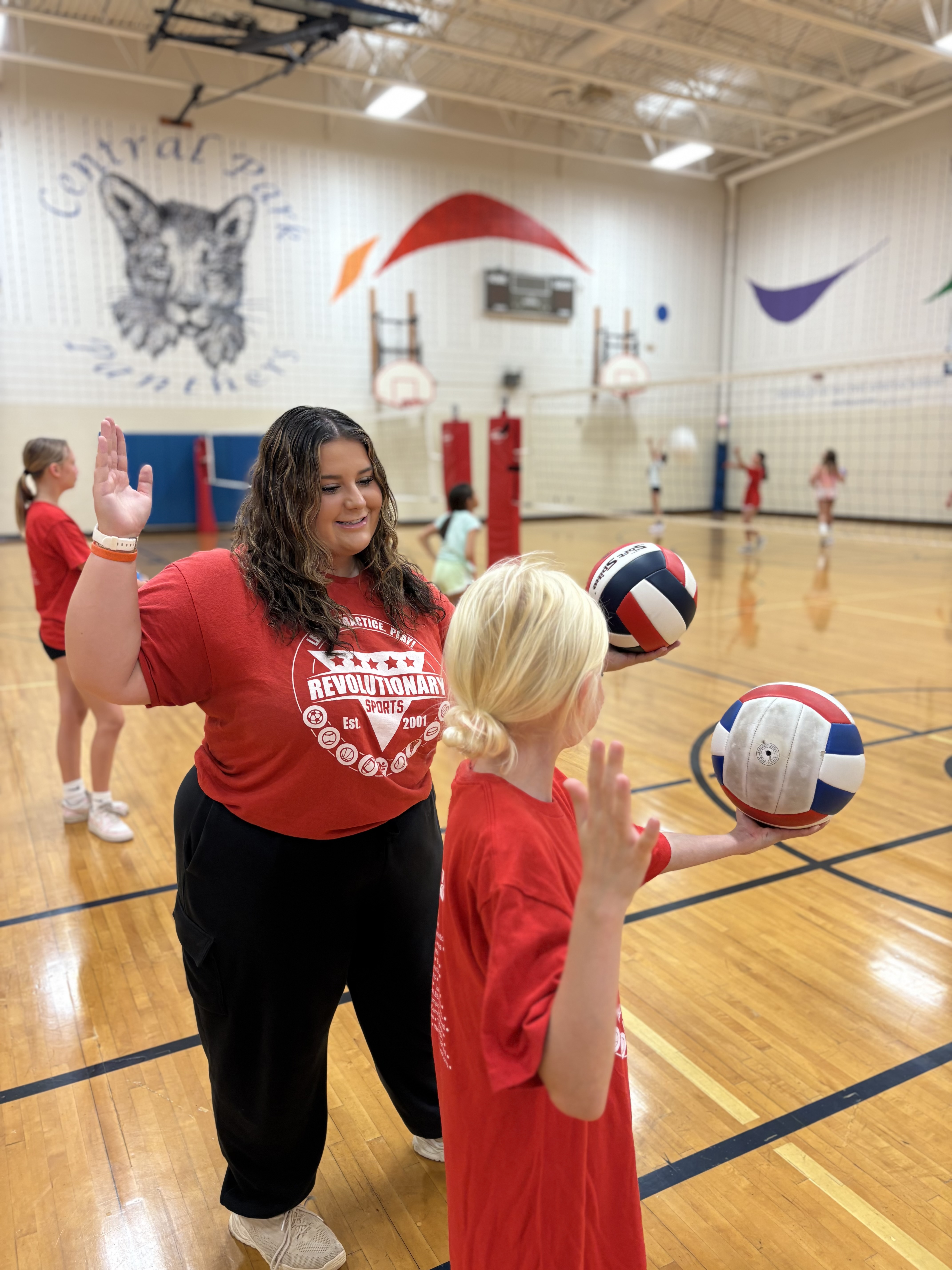 RevSports coach leading athletes