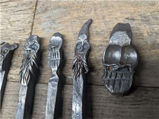 Carving Faces in Metal