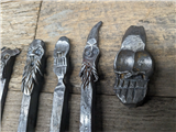 Carving Faces in Metal
